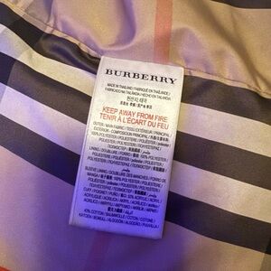 Burberry Garment with Black, Gray, and Pink Stripes
